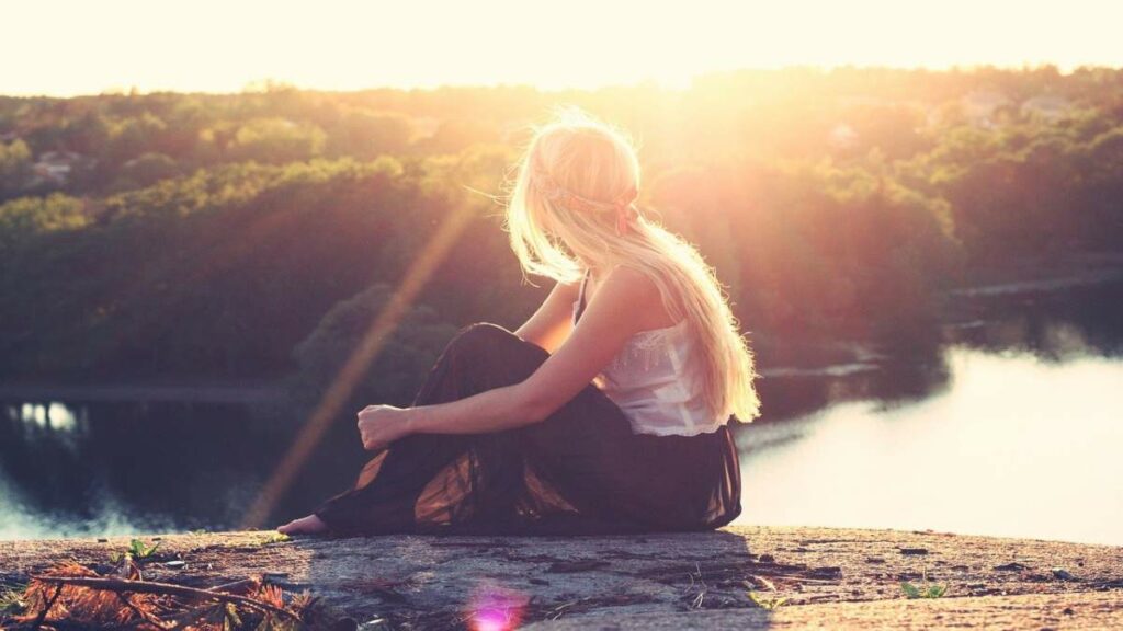 woman sitting in sunlight